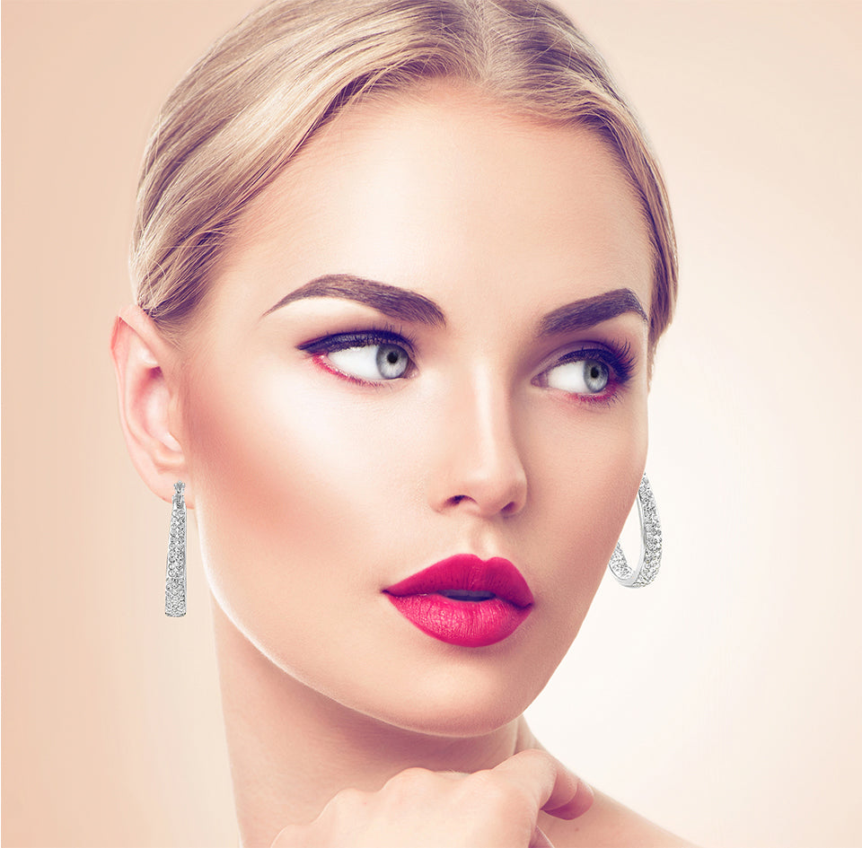 Blonde Woman Wearing Graduated Crystal Hoop Earrings