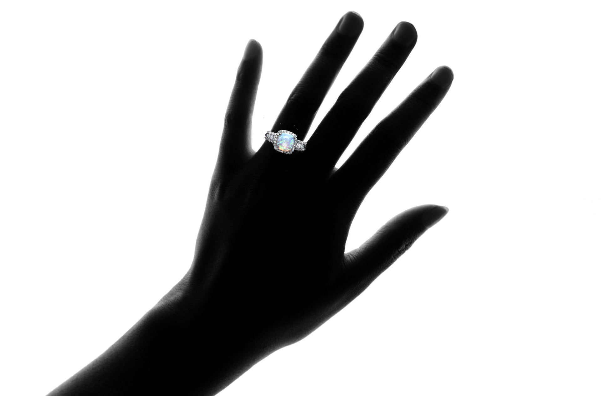 White Fire Opal Cushion Cut Halo Ring On Finger Silhouette