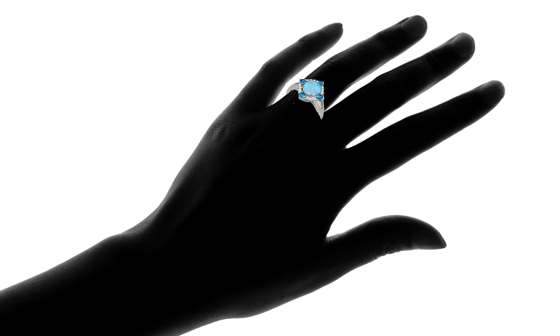 White Fire Opal And Aquamarine Ring On Finger Silhouette