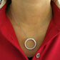 Sterling Silver Circle Of Life Necklace On Neck