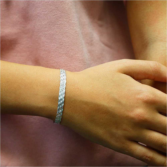 Silver Italian Sterling Silver Diamond Cut Braided Herringbone Bracelet On Wrist