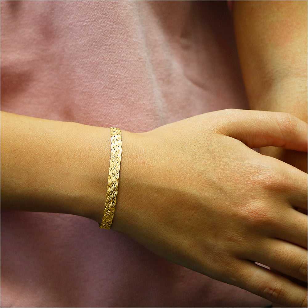 Gold Italian Sterling Silver Diamond Cut Braided Herringbone Bracelet On Wrist