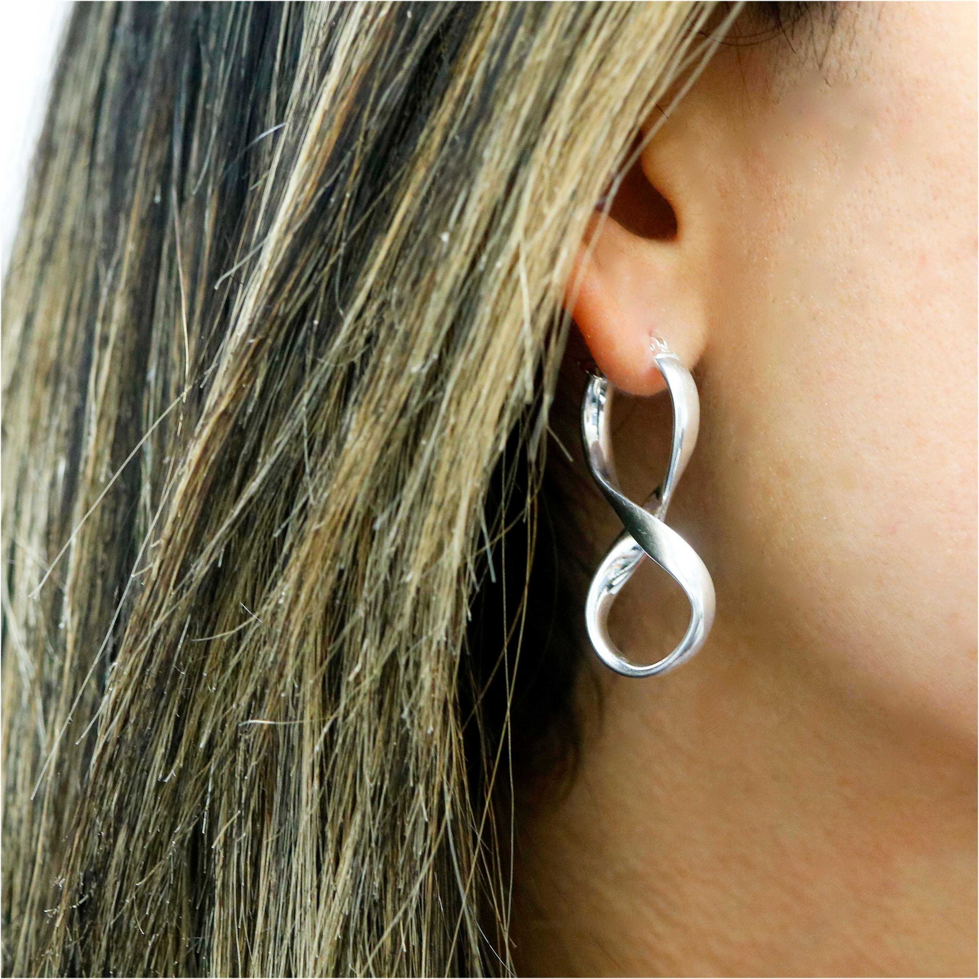 Solid Sterling Silver Figure 8 Earrings On Ear