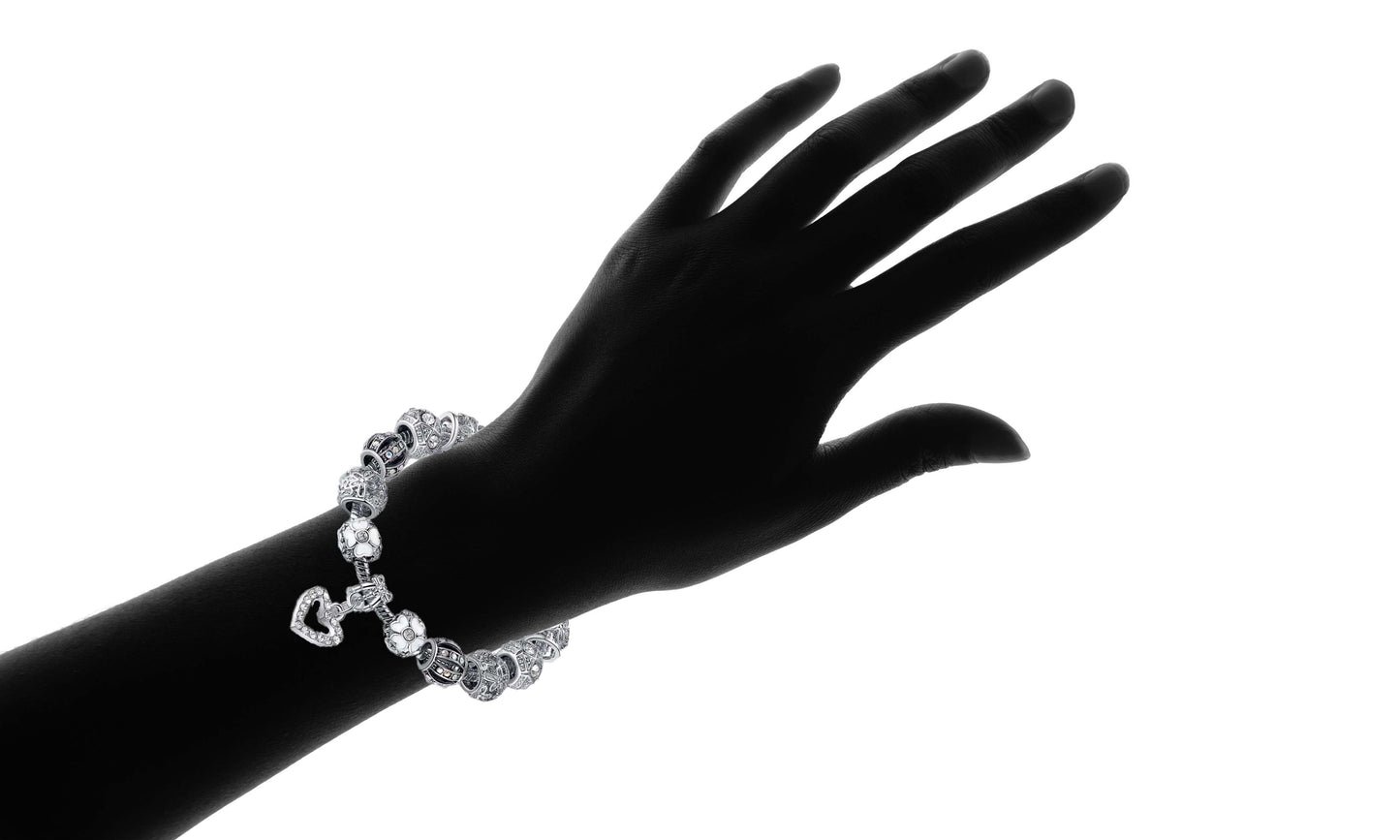 Crystal Heart Charm Bracelet On Hand Silhouette
