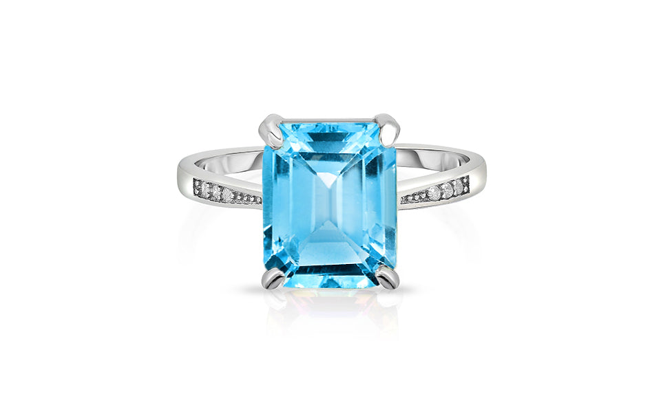 4.00 CTW Emerald Cut Genuine Blue Topaz Ring in Sterling Silver
