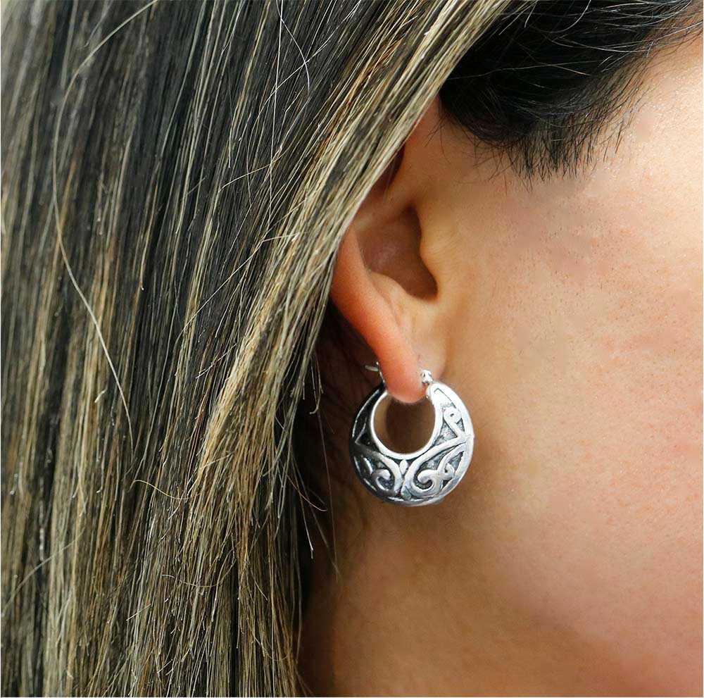 Sterling Silver Artisan Handcrafted Hoop Earrings On Ear