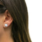 Sterling Silver Cushion Cut Opal Halo Stud Earrings On Ear